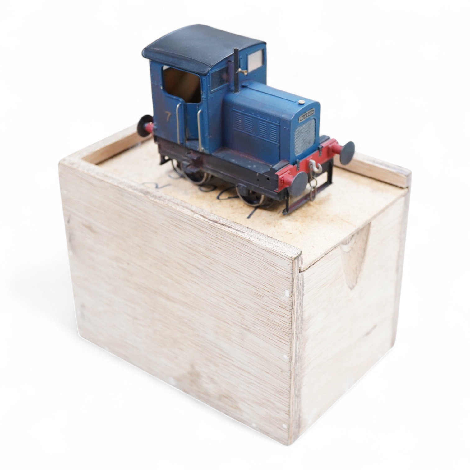 A narrow gauge scratch built model railway locomotive running on 32mm track by John Worsley, a Ruston 0-4-0 diesel shunter, 7, a detailed model with sprung buffers, etc. and fitted with a Mashima 12v dc motor, for two ra